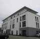 Neubau Wohn- und Geschäftshäuser mit Tiefgarage in Rottendorf