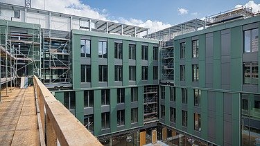 Construction site photo of the construction of an office building