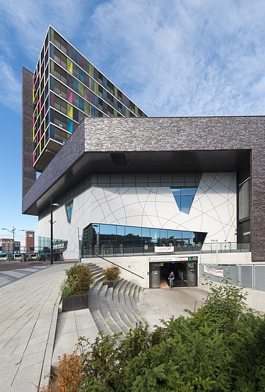 Side view of the building with bicycle exit