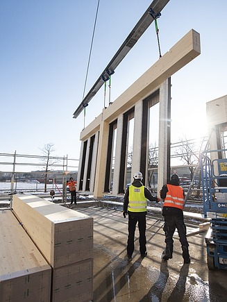 Photo assembly cross laminated timber wall element construction site 