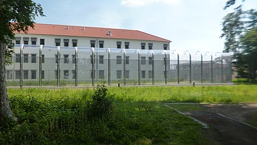 Exterior view of the psychiatric ward from outside the security fence