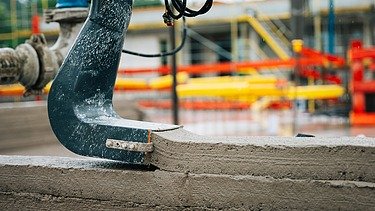 Photo Creation of a concrete wall using 3D concrete printing