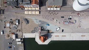 Aerial view of the Hansakai with bank protection and water surface.