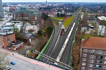 Picture of a railroad track between houses