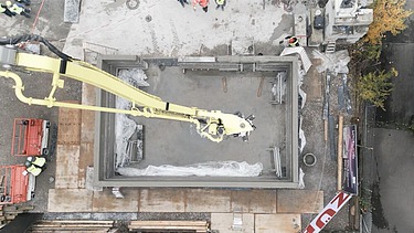 Foto Entstehung der Betonwände einer Lagerhalle mittels 3D-Betondruck in Weilimdorf