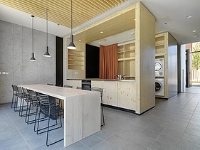 Foto des Gebäudes SKAIO Stadtsiedlung in Heilbronn. Man sieht einen möblierten Innenraum.