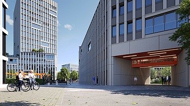 Picture shows a high-rise office building with a blue sky and a forecourt
