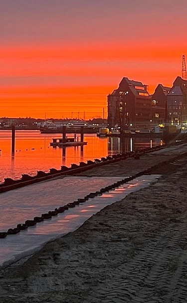 Picture shows a concrete quay in an industrial port