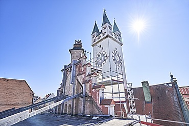Historical building view of Straubing town hall with neo-Gothic façade and striking tower.