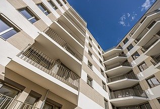 View from below looking upwards of the Atriumquartiers residential complex in Leipzig