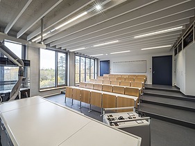 Interior view of the classroom with steps for the different rows of seats