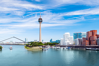 Photo View of the television tower in Düsseldorf, on the right the Gehry buildings