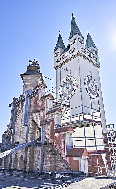 Historical building view of Straubing town hall with neo-Gothic façade and striking tower.