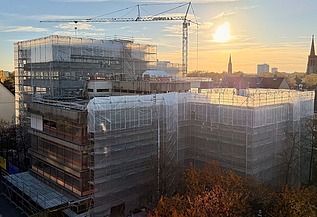 Visualisation: evening view of the ‘Bauen im Bestand’ project at the Central Library in Cologne