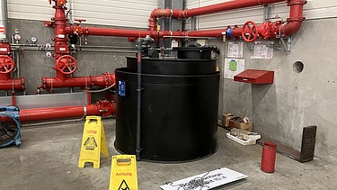 Extinguishing agent tank.
