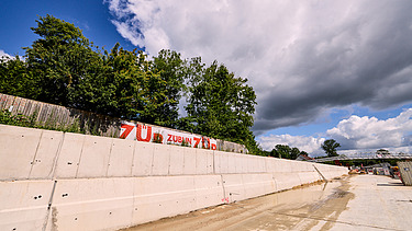 Baustelle der Trog Mauritz mit Bauzaunbannern von ZÜBLIN