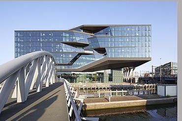 Exterior view of the ODE building from a bridge