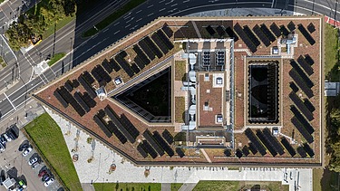 Aerial view of the new administration center - Stadtforum Dresden. Top shape of the building becomes clear.
