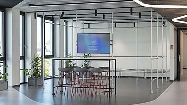 The Innovation Center in Stuttgart, open space with screen