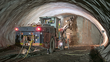 Picture of a tunnel boring vehicle drilling into a wall