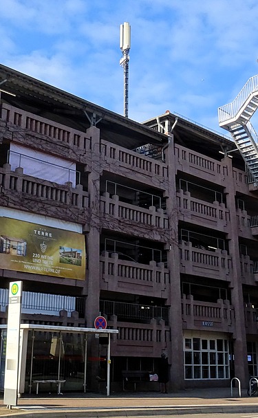 Photo of a parking garage with elevator tower