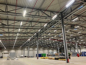 Production and storage hall with sprinkler and extinguishing water system.