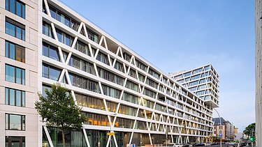 Image of an office building with diagonal steel composite columns