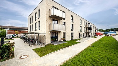 Exterior view of the side of the building with a view of the bicycle parking spaces