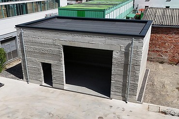 Foto Kaltlagerhalle mit Normalbetonwänden aus dem 3D-Betondrucker in Weilimdorf bei Stuttgart