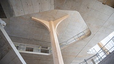 Picture of a wooden ceiling with wooden columns