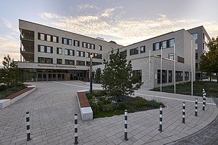 Exterior view of the grammar school with a view of the schoolyard