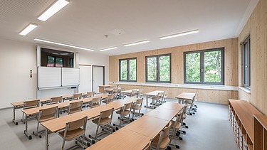 Picture of a classroom with wooden walls from MOLENO®