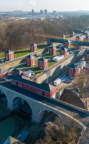 Photo of a lock with surrounding houses