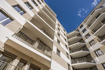View from below looking upwards of the Atriumquartiers residential complex in Leipzig