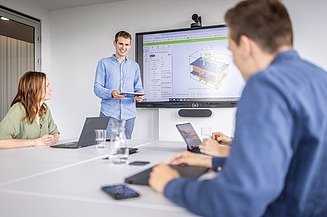 Foto Mitarbeiter in einer Planungsbesprechung