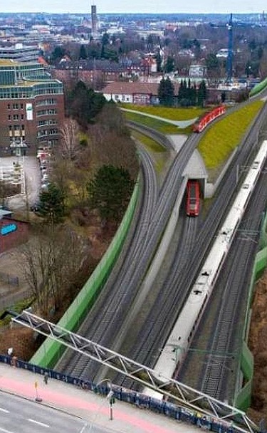 Picture of a railroad track between houses