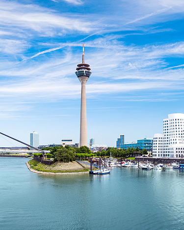 Photo View of the television tower in Düsseldorf, on the right the Gehry buildings