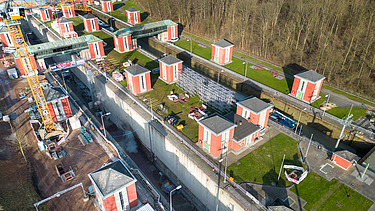 Photo of a lock with surrounding houses