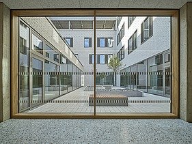 Window view of the inner courtyard of the SKD