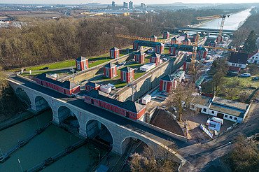 Photo of a lock with surrounding houses