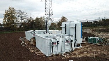 Picture of the construction water purification system on a newly built electricity pylon