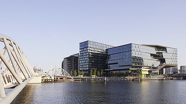 Exterior view of the ODE building from the water