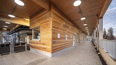 Picture of a cable car station with wooden cladding