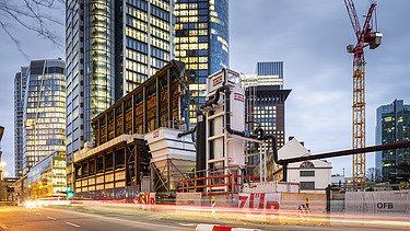 Picture of the construction water purification plant at dusk.
