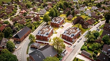 Top bird's eye view of the CONEPT Heikendorf residential complex from afar