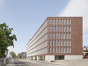 View of the Bürotel with underground parking garage entrance and Karlsruhe Central Station in the background